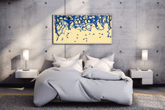 Scattered Blue Paint on Yellow Background Abstract Wall Art