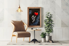 Astronaut in the space holding a big red heart wall art