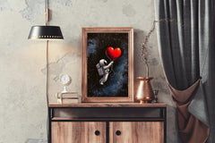 Astronaut in the space holding a big red heart wall art - beink online art store